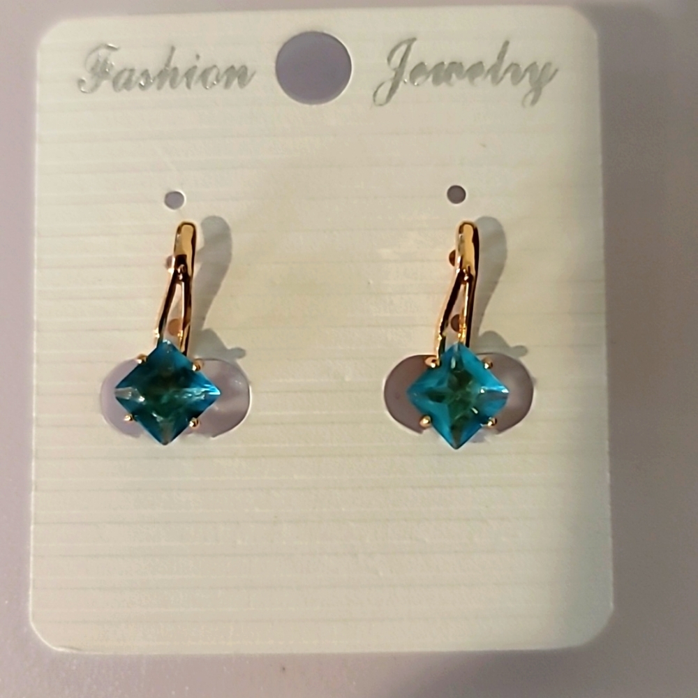 Blue huggie earrings